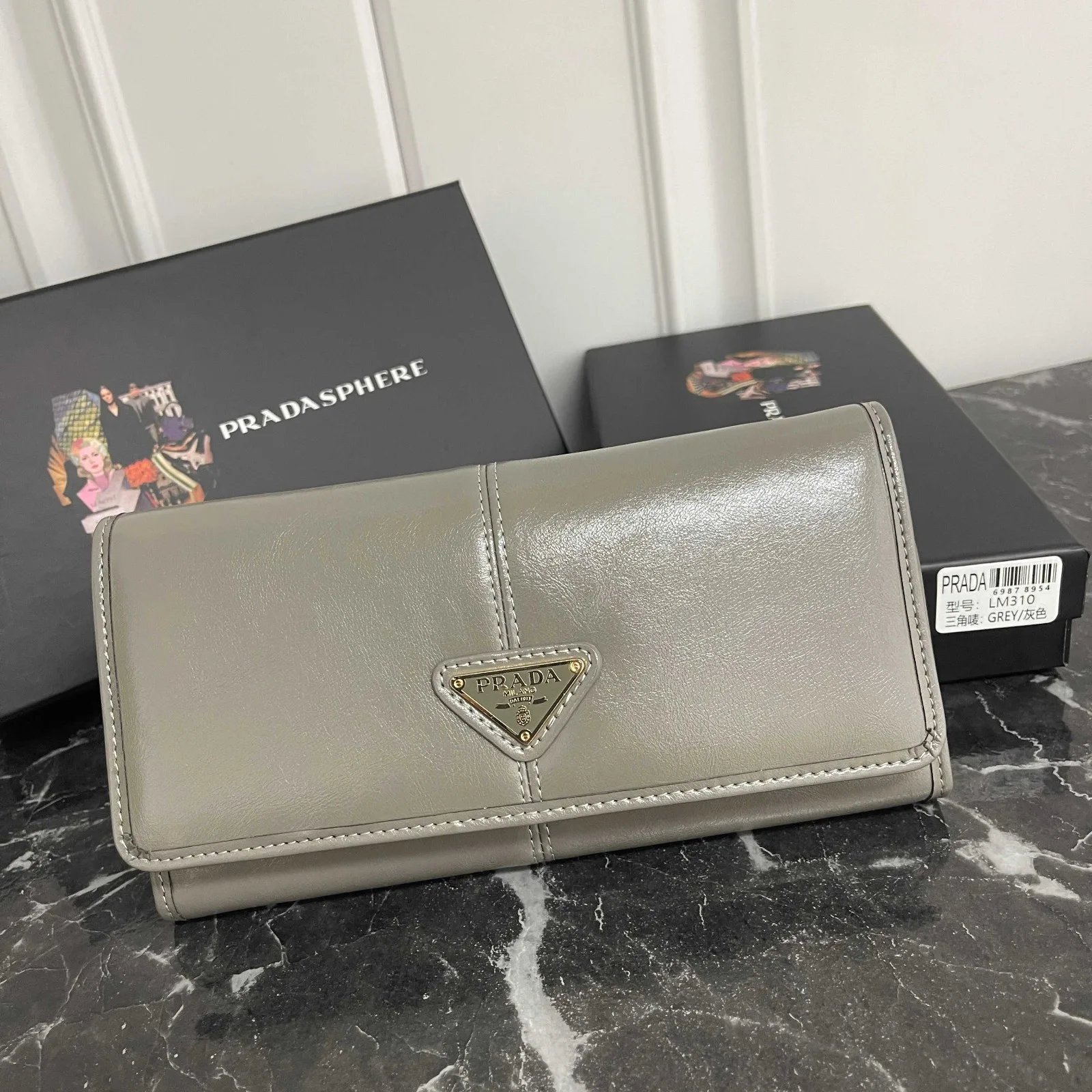 洗練された 上品 長財布 プラダ 財布 コピー ユニセックス グレー 洗練された 上品 長財布 プラダ 財布 コピー ユニセックス グレー