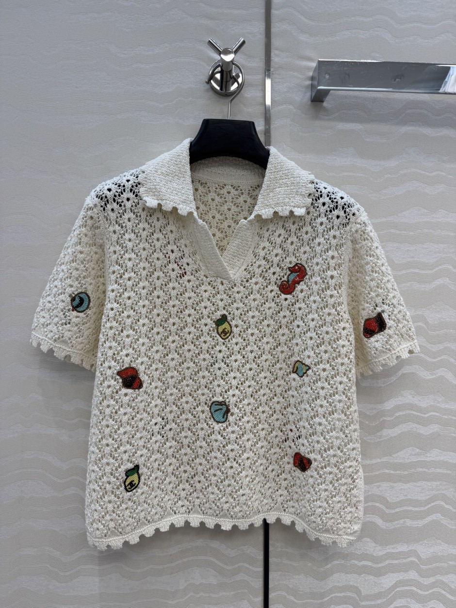 刺繍入り 透かし編み ニット ポロシャツ シャネル ニット 偽物 オフ 刺繍入り 透かし編み ニット ポロシャツ シャネル ニット 偽物 オフ