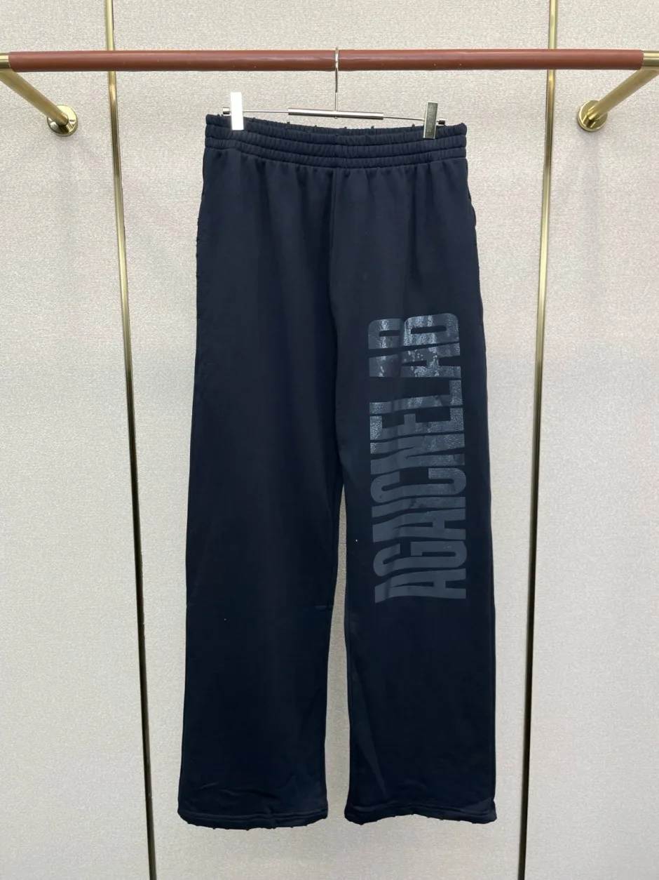 カジュアル ロゴ入り スウェットパンツ バレンシアガ パンツ 偽物 ブラック カジュアル ロゴ入り スウェットパンツ バレンシアガ パンツ 偽物 ブラック