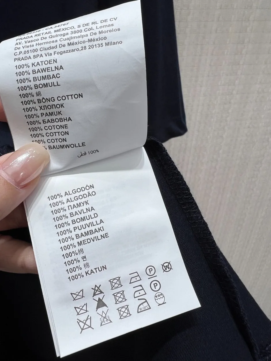 シンプル 洗練された 半袖Tシャツ プラダ Tシャツ 偽物 コットン クルーネック ネイビー