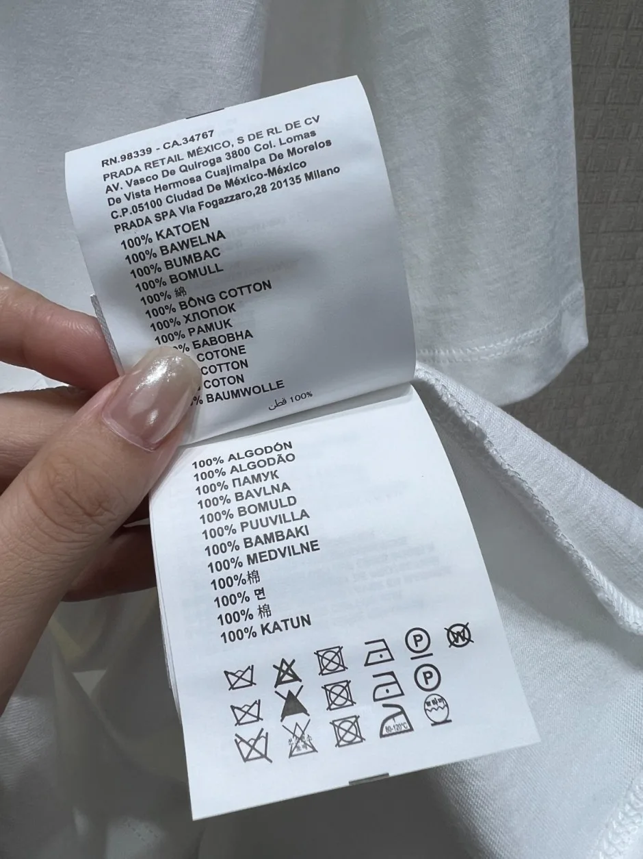 1787993749659845.webp シンプル 洗練された 半袖Tシャツ プラダ Tシャツ 偽物 コットン クルーネック ホワイト